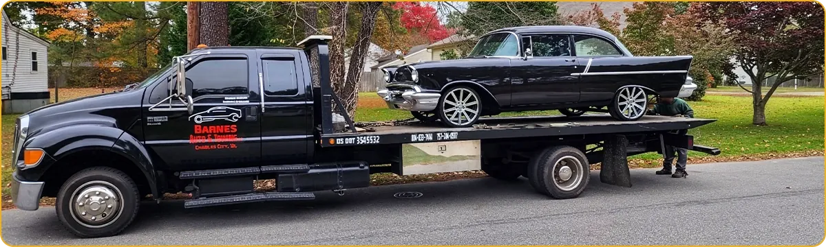 Barnes Auto & Towing flatbed performing light-duty towing in Charles City, VA